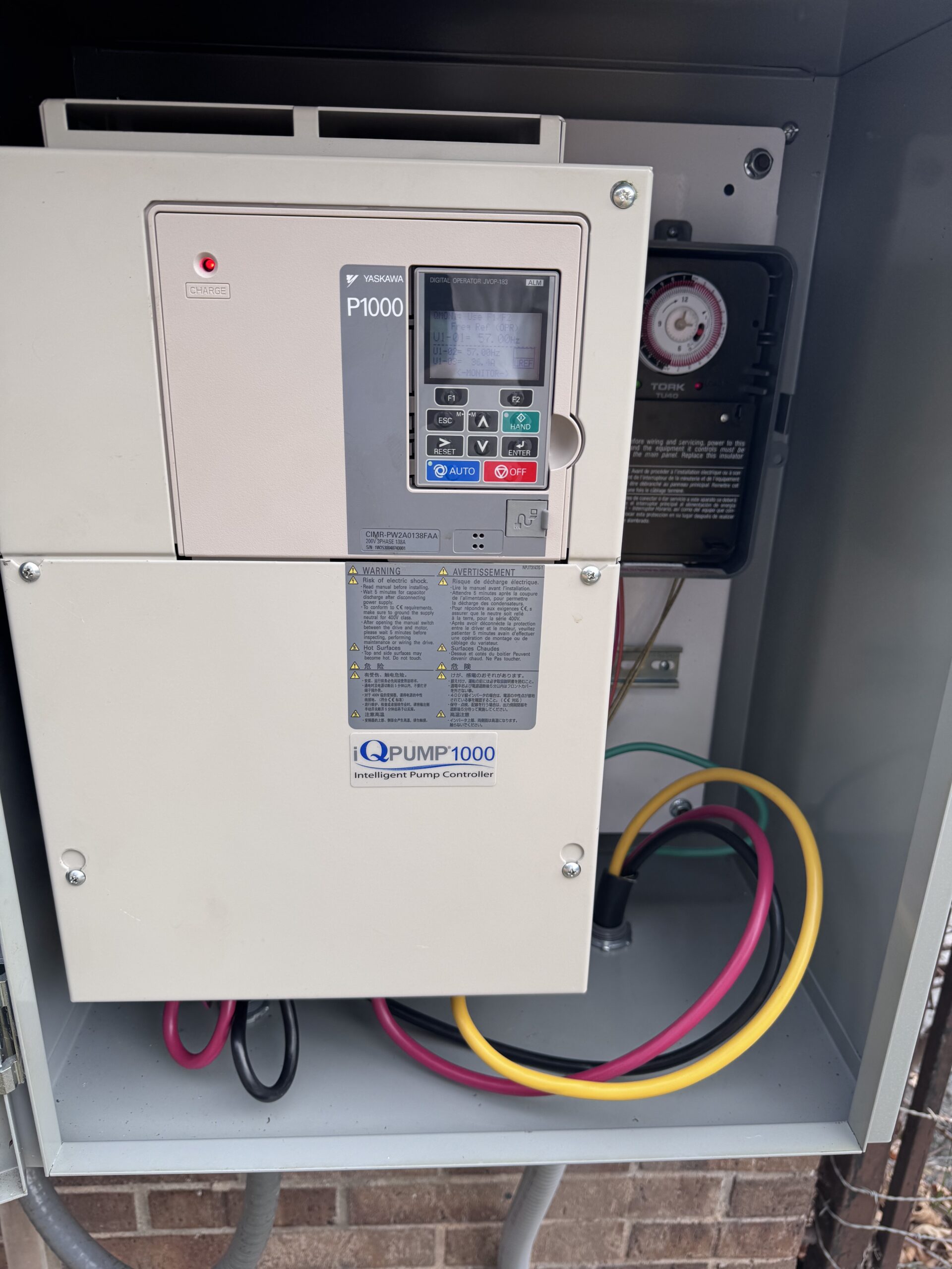 Intelligent pump controller panel installed inside outdoor electrical cabinet for residential well system